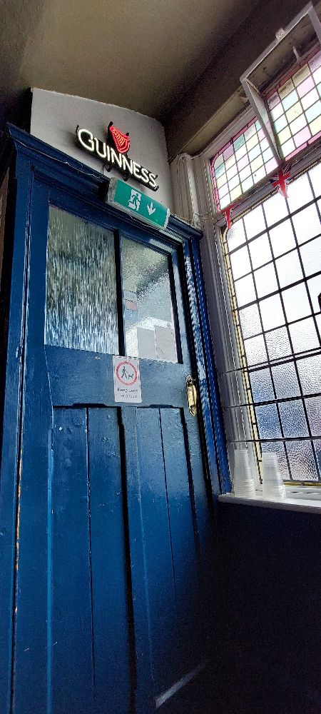 One of the doors of the Dolphin Hotel, on the Barbican at Plymouth.